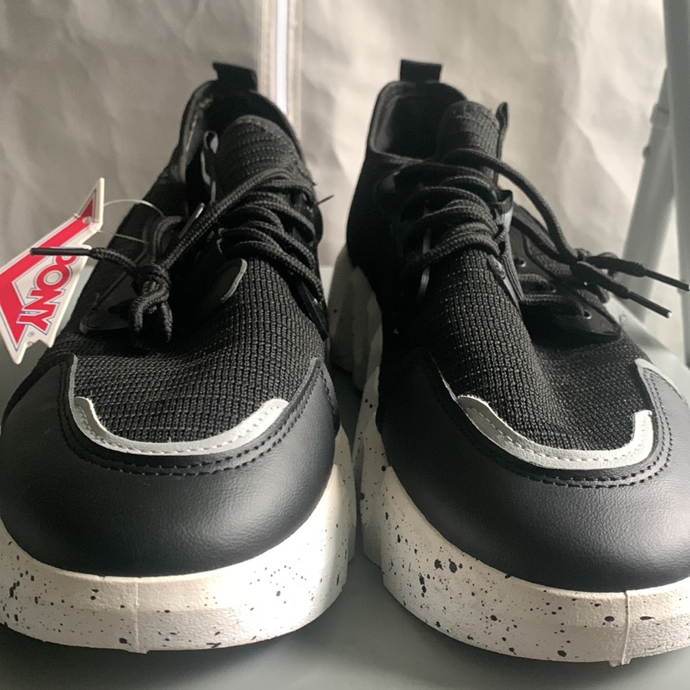 The brand is Pony, Size 10, and Color black and white